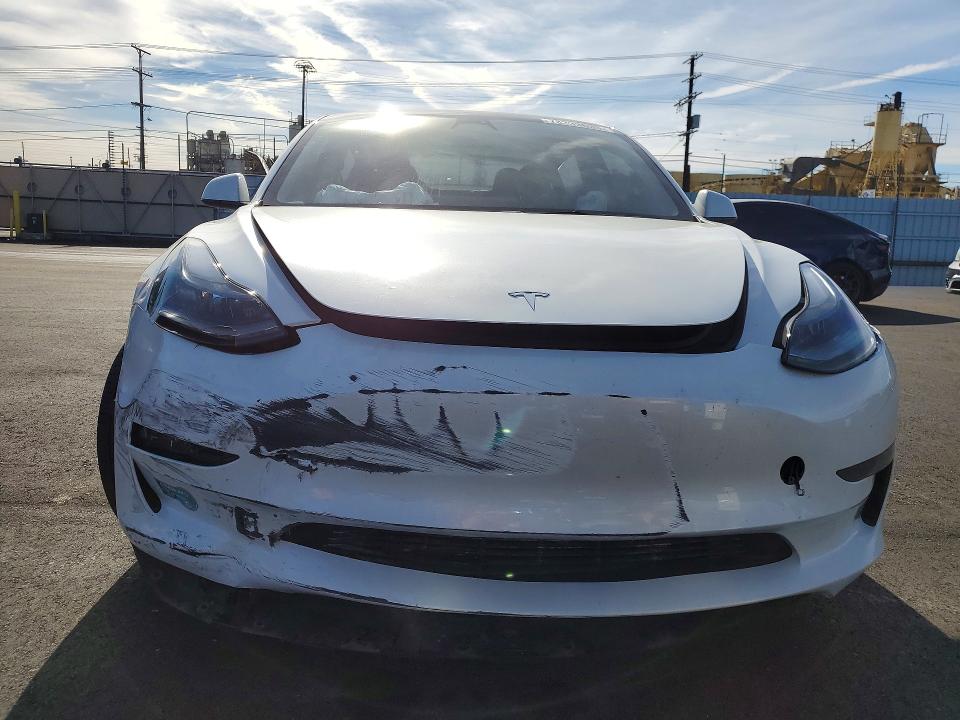 Photo 5 from auction – 2023 TESLA MODEL 3 with VIN 5YJ3E1EA1PF620311
