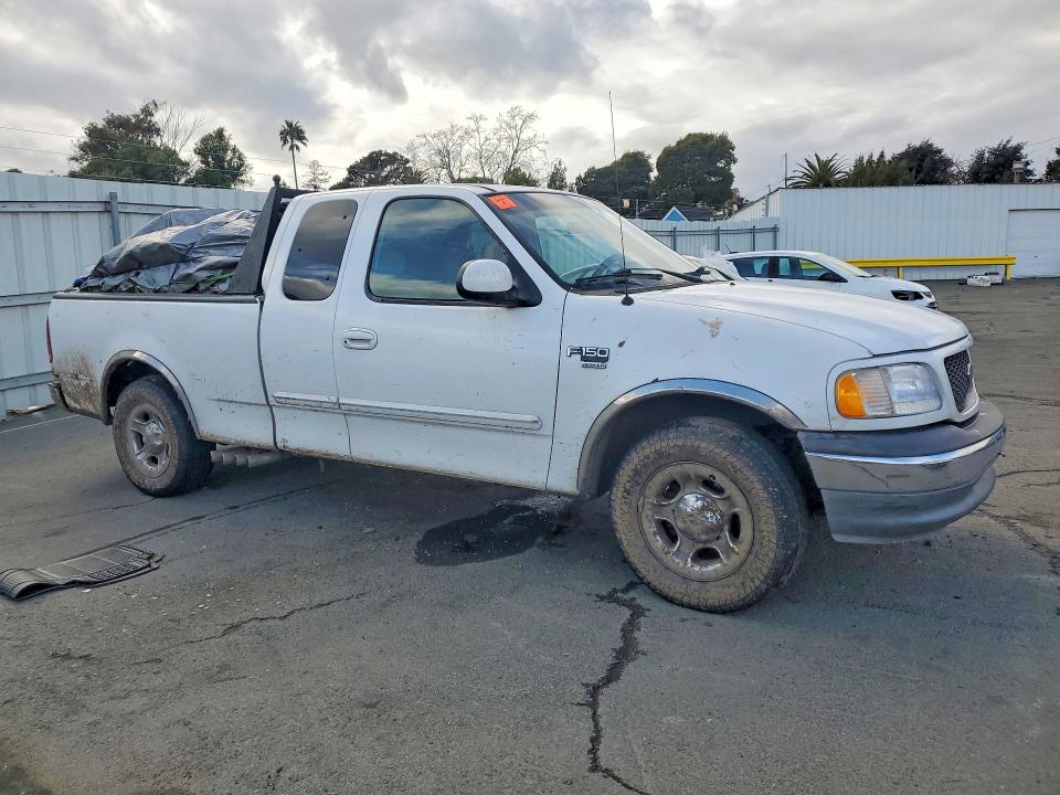 Photo 4 from auction – 2002 FORD F150 with VIN 1FTRX17W72NB11234