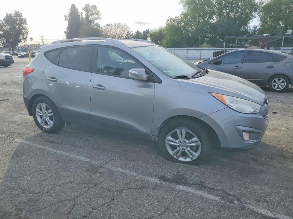 Photo 4 from auction – 2013 HYUNDAI TUCSON GLS with VIN KM8JUCACXDU697089