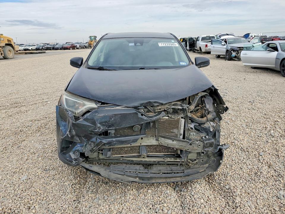 Photo 5 from auction – 2018 TOYOTA RAV4 with VIN 2T3ZFREV7JW490514