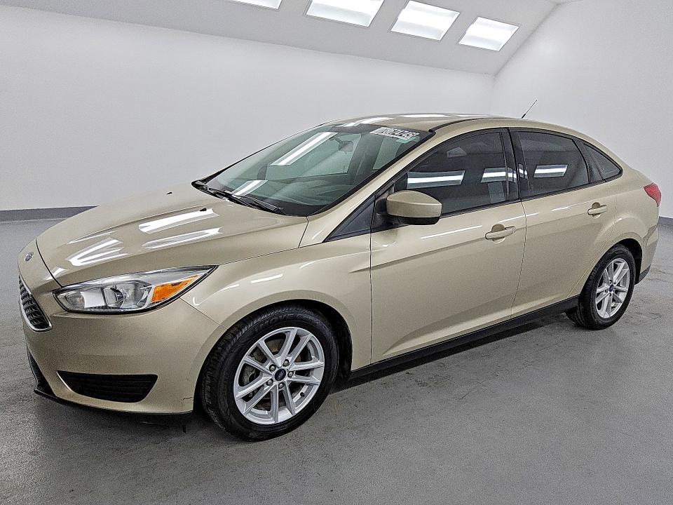FORD FOCUS 2018 with VIN 1FADP3FE3JL270511 - Photo from auction