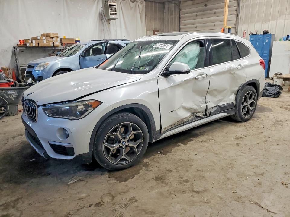 BMW X1 XDRIVE2 2016 with VIN WBXHT3C31G5E47506 - Photo from auction