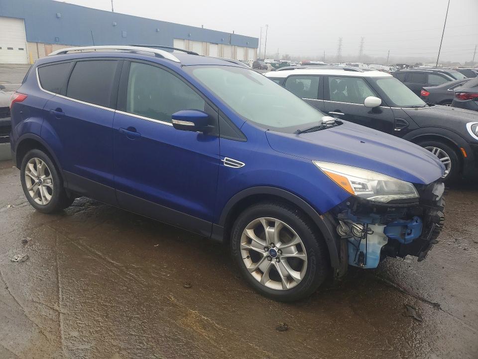 Photo 4 from auction – 2014 FORD ESCAPE TIT with VIN 1FMCU0JX9EUE37858