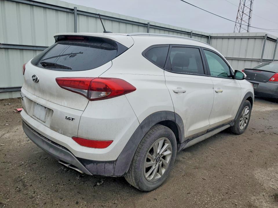 Photo 3 from auction – 2017 HYUNDAI TUCSON with VIN KM8J33A21HU303415