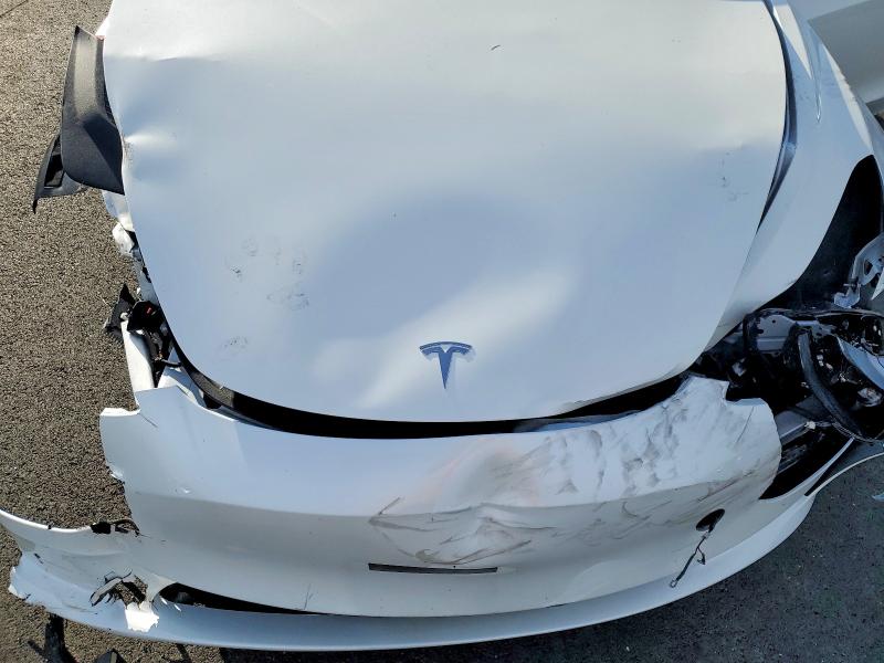 Photo 11 from auction – 2023 TESLA MODEL 3 with VIN 5YJ3E1EA8PF562360