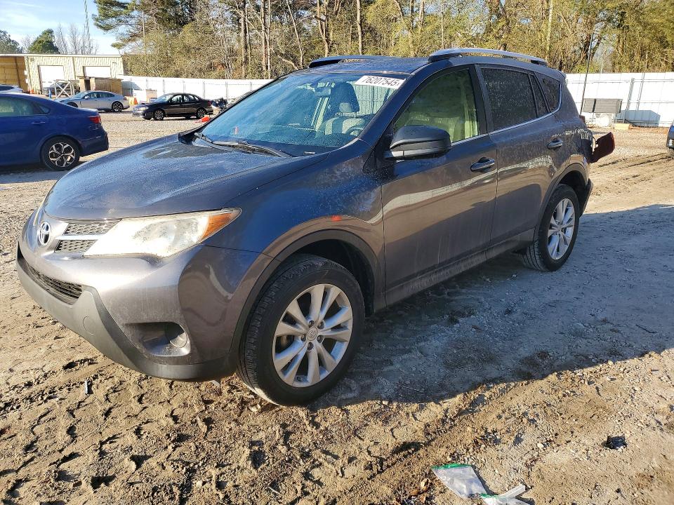 TOYOTA RAV4 2014 z numerem VIN JTMZFREV0EJ014884 - Zdjęcie z aukcji