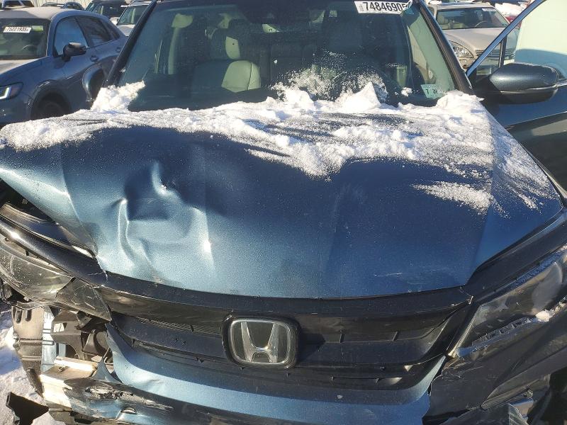 Photo 12 from auction – 2021 HONDA PILOT SE with VIN 5FNYF6H27MB096596