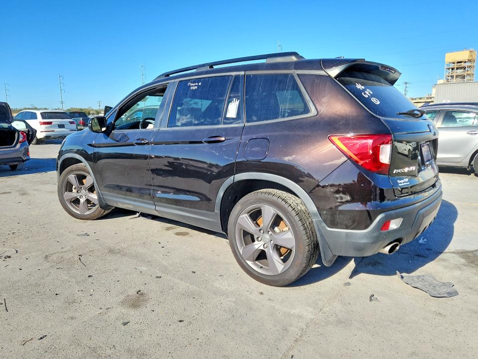 Photo 2 from auction – 2021 HONDA PASSPORT with VIN 5FNYF7H97MB010383