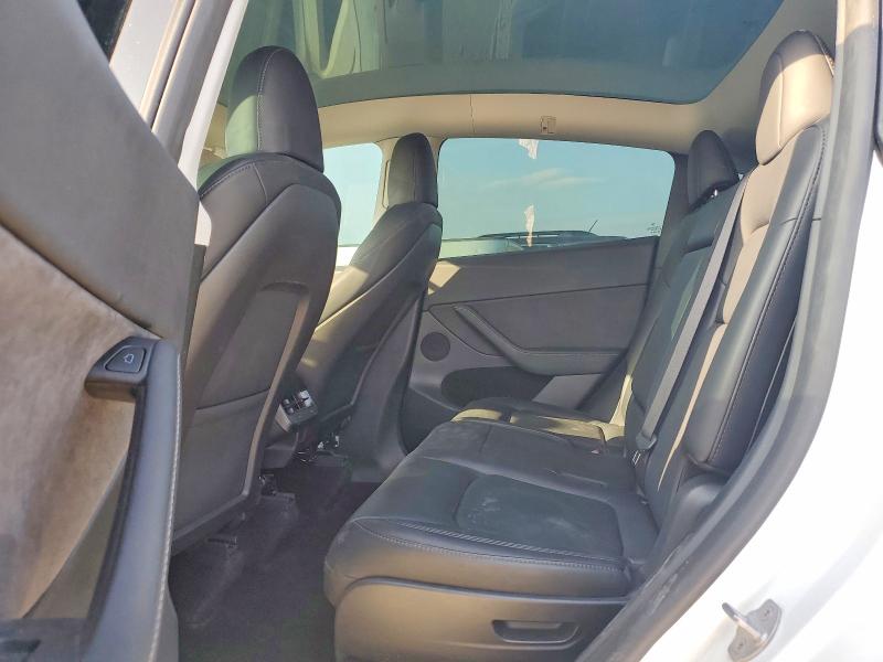 Photo 10 from auction – 2023 TESLA MODEL Y with VIN 7SAYGAEE4PF876660
