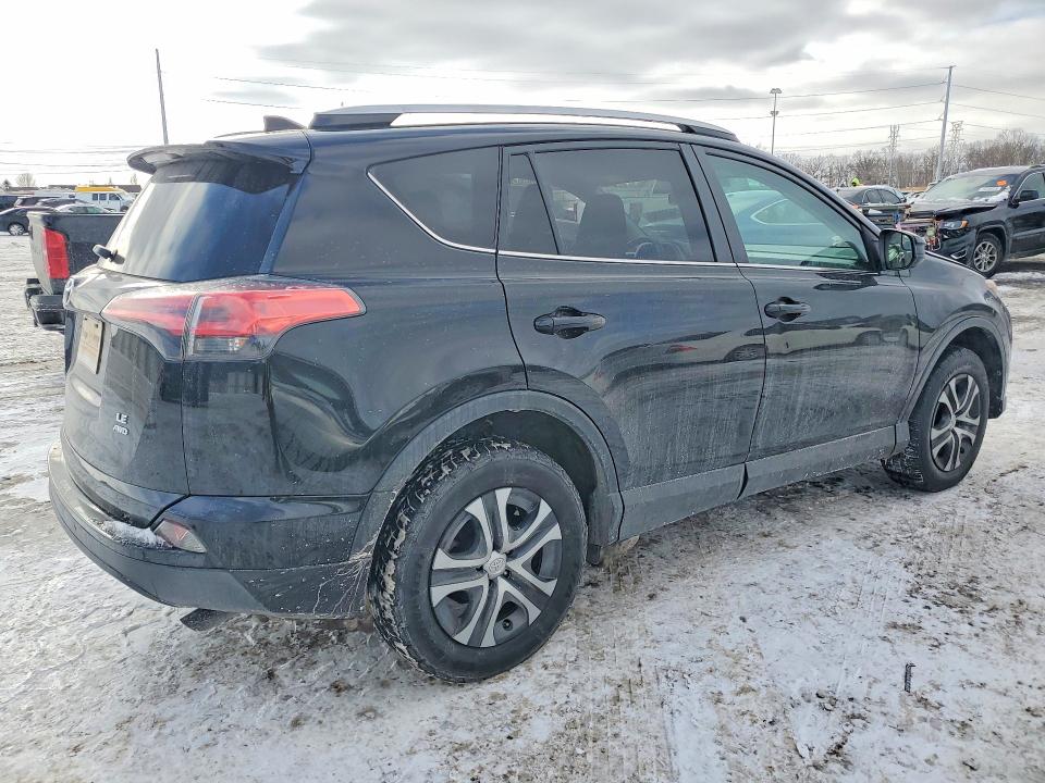 Photo 3 from auction – 2017 TOYOTA RAV4 LE with VIN 2T3BFREV3HW545729