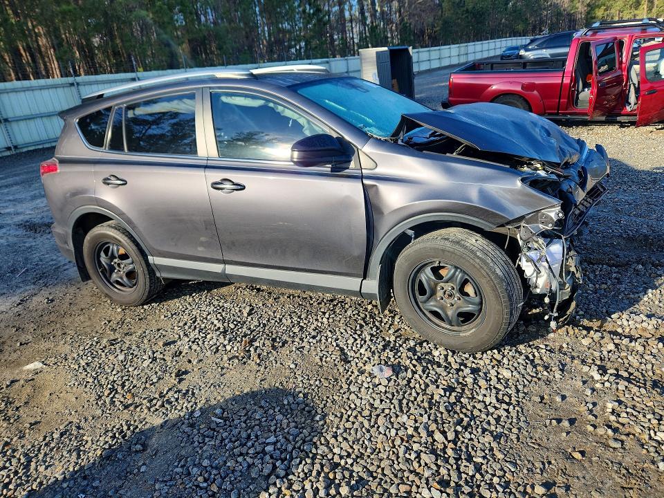 Photo 4 from auction – 2018 TOYOTA RAV4 LE with VIN JTMZFREV0JJ723566