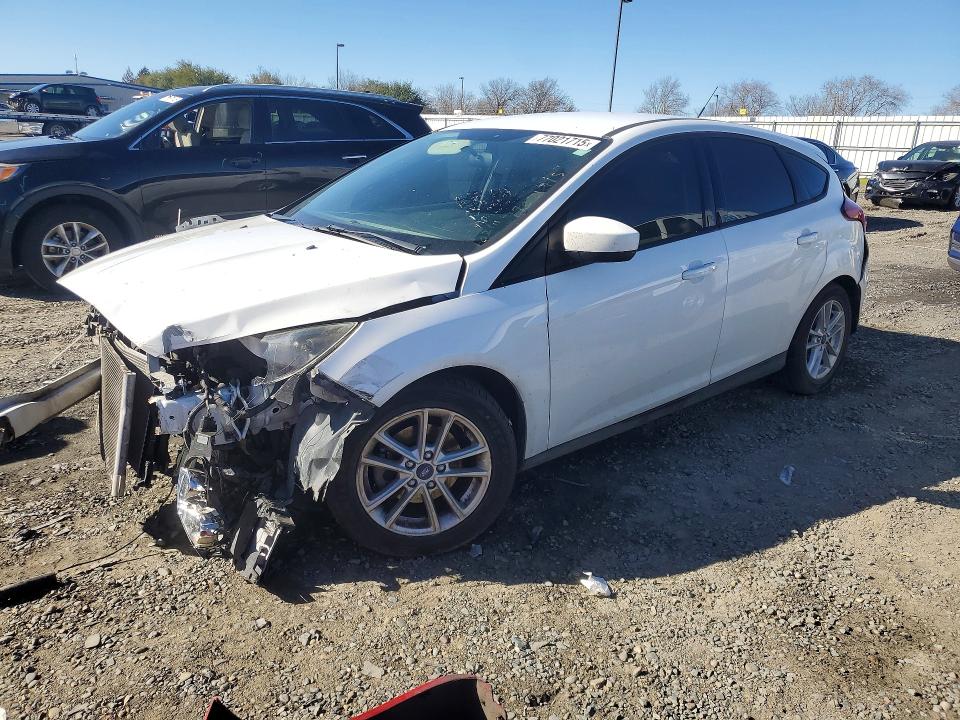 FORD FOCUS SE 2018 with VIN 1FADP3K20JL316260 - Photo from auction