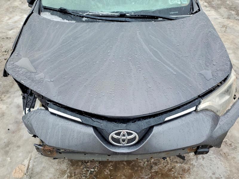 Photo 11 from auction – 2016 TOYOTA RAV4 with VIN JTMBFREV0GJ067752