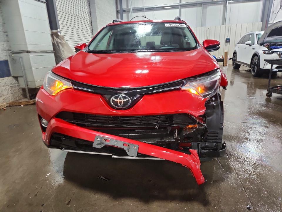 Photo 5 from auction – 2017 TOYOTA RAV4 with VIN 2T3RFREV0HW571719