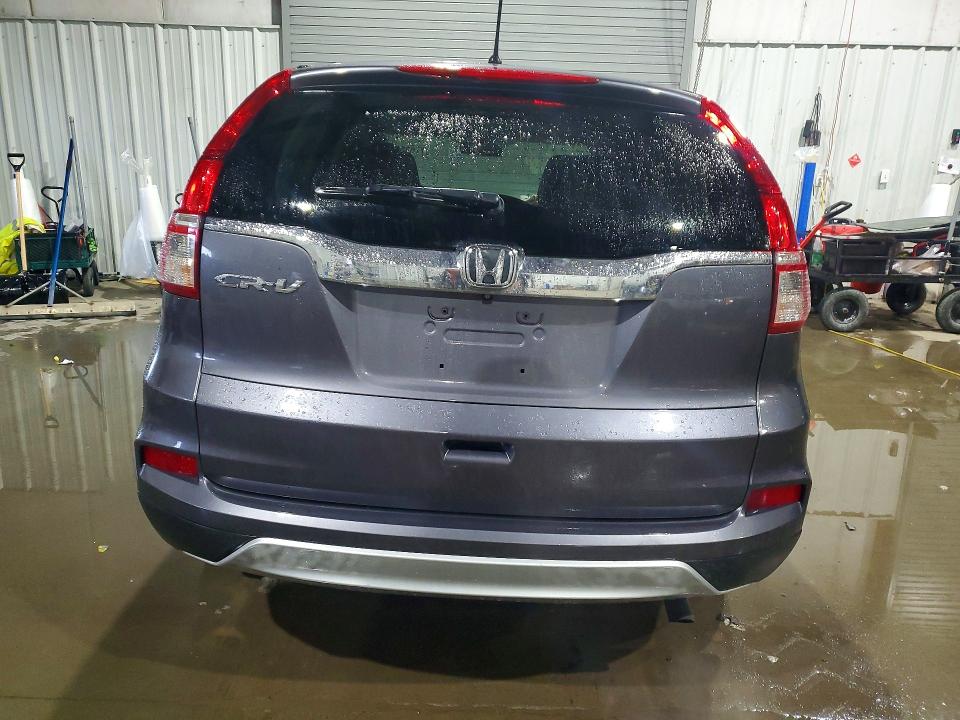 Photo 6 from auction – 2016 HONDA CR-V with VIN 3CZRM3H51GG714250