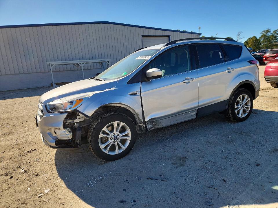 FORD ESCAPE 2018 with VIN 1FMCU9GD4JUB58281 - Photo from auction