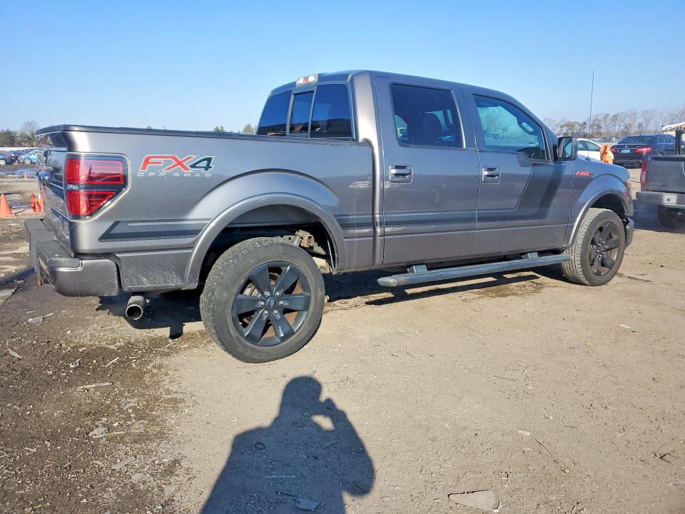 Foto 3 de la subasta – 2014 FORD F150 con VIN 1FTFW1EF7EFC63845