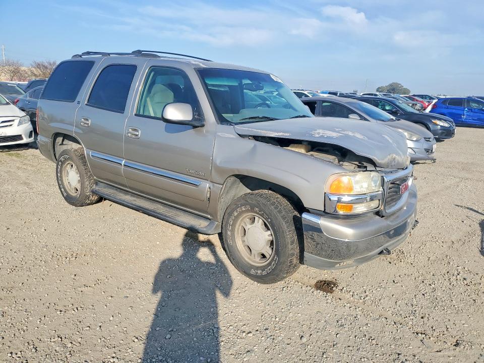 Photo 4 from auction – 2001 GMC YUKON with VIN 1GKEC13T91J113373