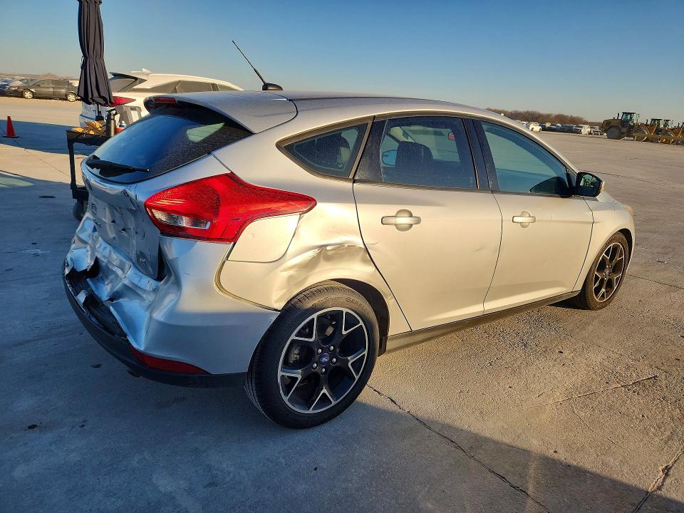 Photo 3 from auction – 2016 FORD FOCUS with VIN 1FADP3K21GL321654