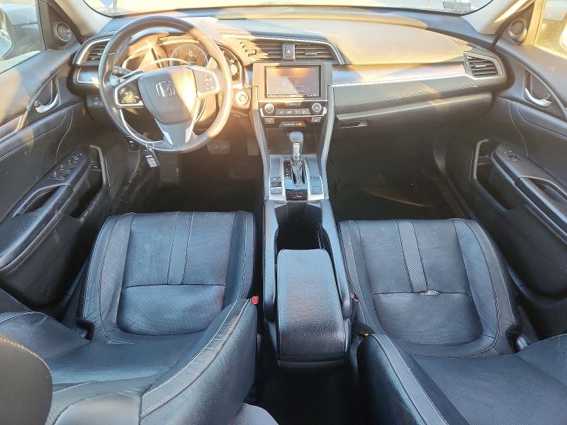 Photo 8 from auction – 2018 HONDA CIVIC EX with VIN JHMFC1F85JX043857