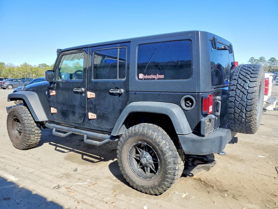 Foto 2 de la subasta – 2012 JEEP WRANGLER U con VIN 1C4BJWFG0CL104228