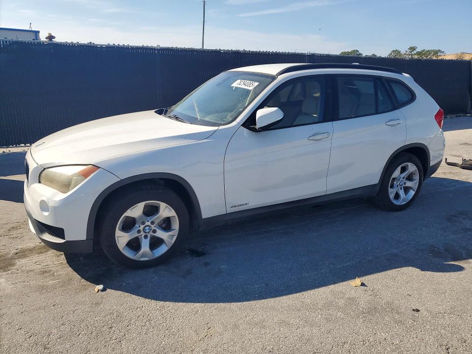 BMW X1 2014 with VIN WBAVM1C56EVW48411 - Photo from auction