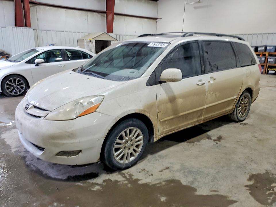 TOYOTA SIENNA XLE 2010 with VIN 5TDYK4CC6AS310288 - Photo from auction