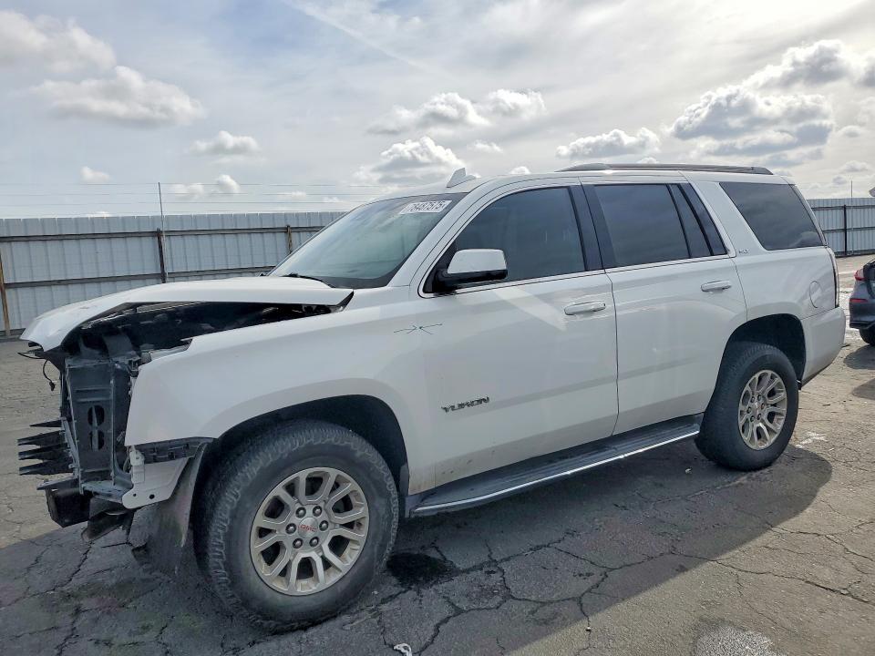 GMC YUKON 2020 with VIN 1GKS2BKC1LR209693 - Photo from auction