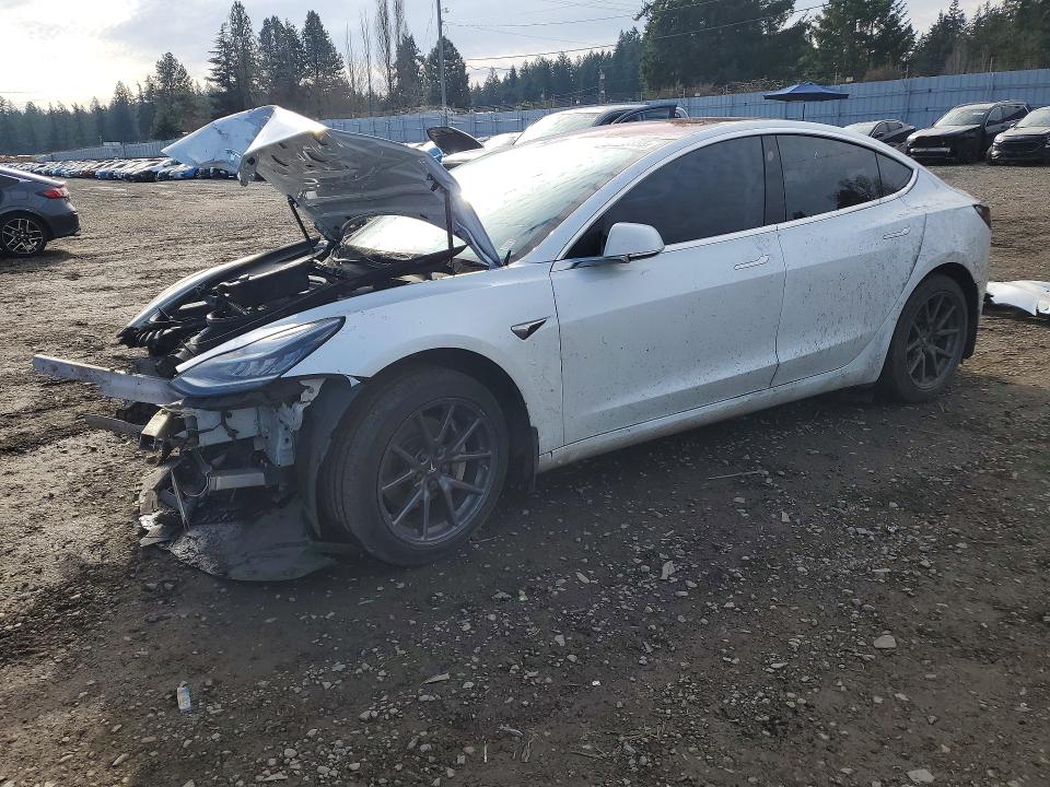 TESLA MODEL 3 2018 with VIN 5YJ3E1EA5JF019765 - Photo from auction