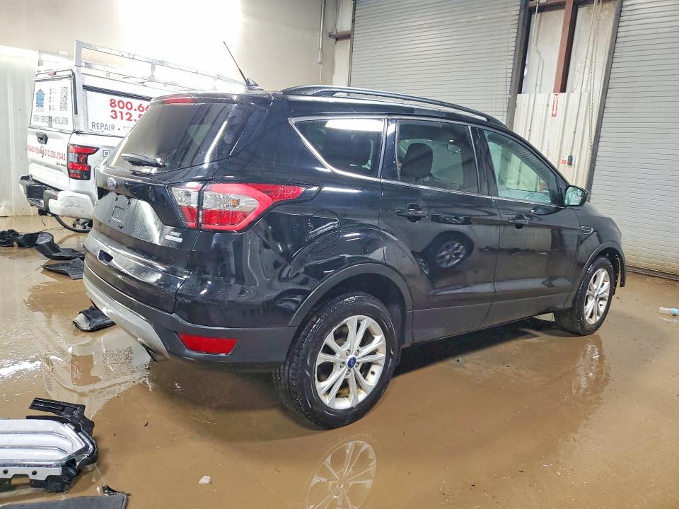 Photo 3 from auction – 2018 FORD ESCAPE with VIN 1FMCU0GD0JUD49403