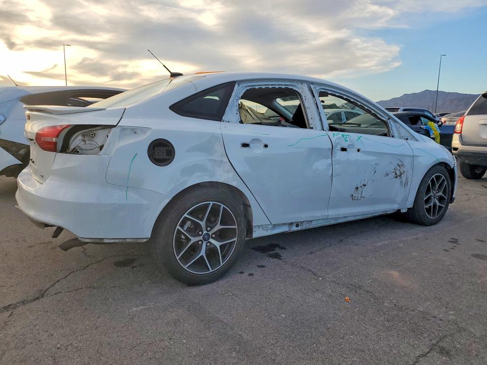 Photo 3 from auction – 2016 FORD FOCUS SE with VIN 1FADP3F24GL406983
