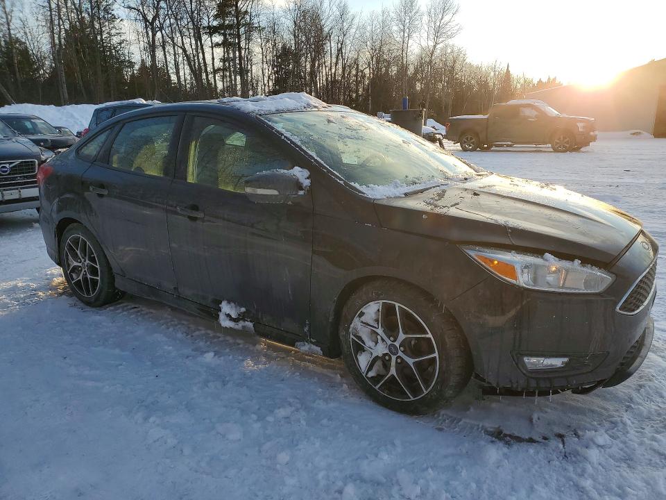 Photo 4 from auction – 2016 FORD FOCUS with VIN 1FADP3F23GL342368