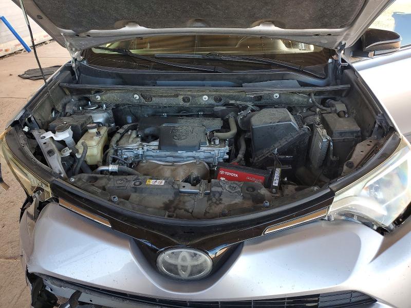 Photo 11 from auction – 2018 TOYOTA RAV4 with VIN JTMZFREV8JJ209304