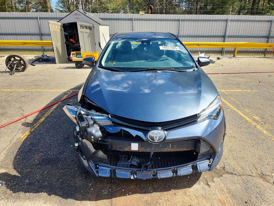 Photo 5 from auction – 2018 TOYOTA COROLLA with VIN 5YFBURHEXJP741359
