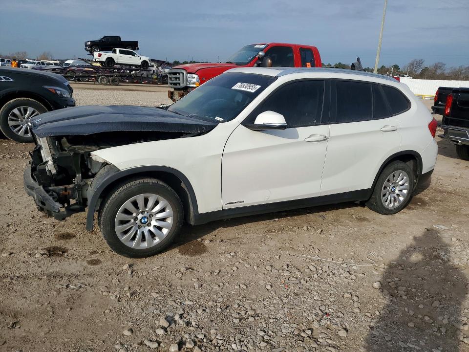 BMW X1 2014 with VIN WBAVM1C50EVW55631 - Photo from auction