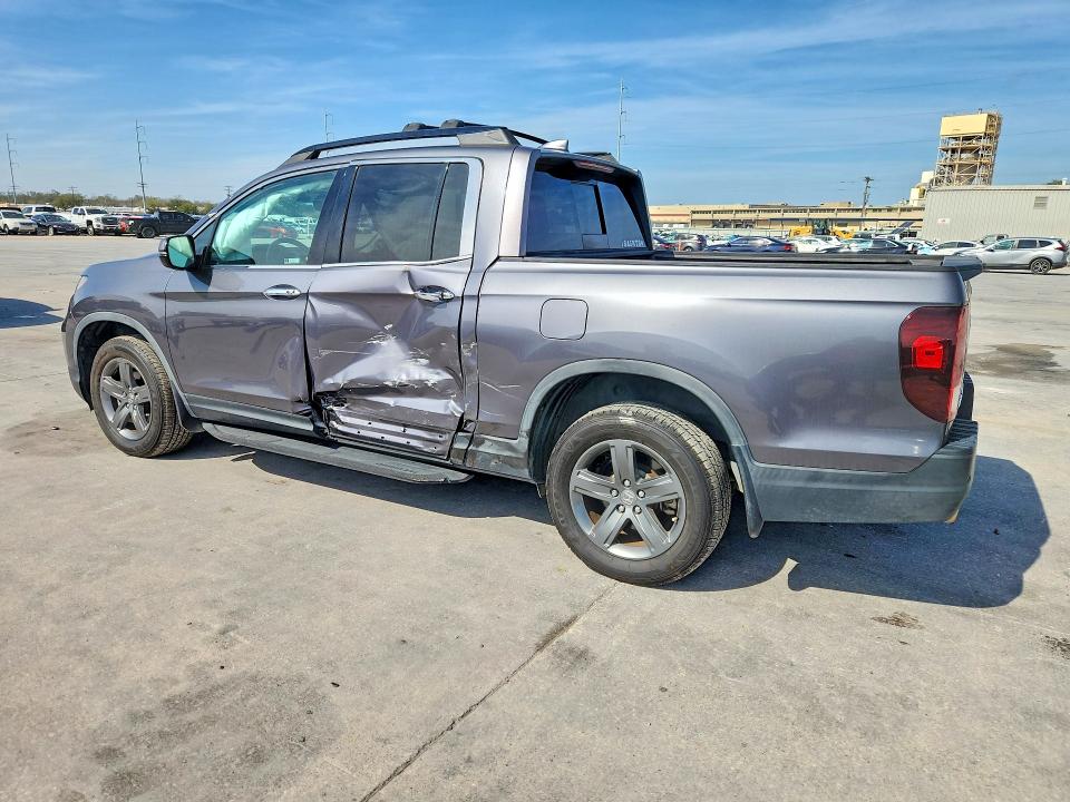 Photo 2 from auction – 2022 HONDA RIDGELINE with VIN 5FPYK3F76NB027772