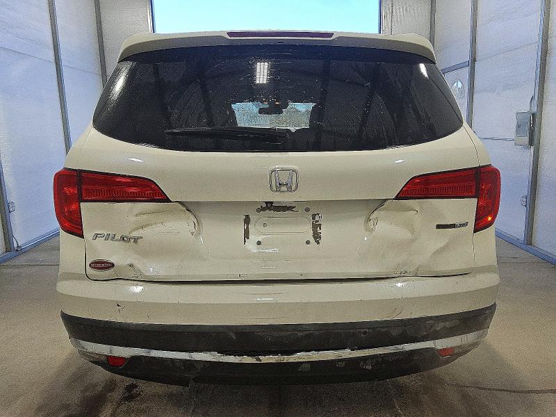 Photo 6 from auction – 2017 HONDA PILOT TOUR with VIN 5FNYF5H96HB039416