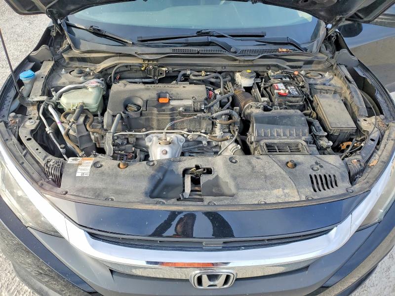 Photo 11 from auction – 2018 HONDA CIVIC with VIN 19XFC2F79JE032262