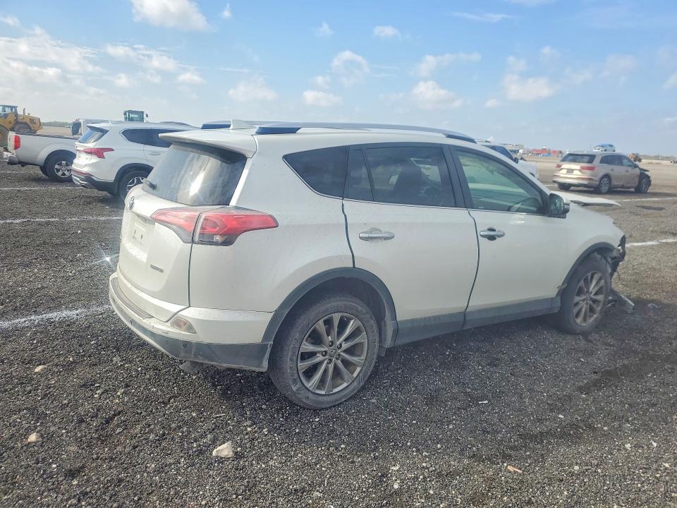 Photo 3 from auction – 2016 TOYOTA RAV4 with VIN JTMYFREVXGJ067512