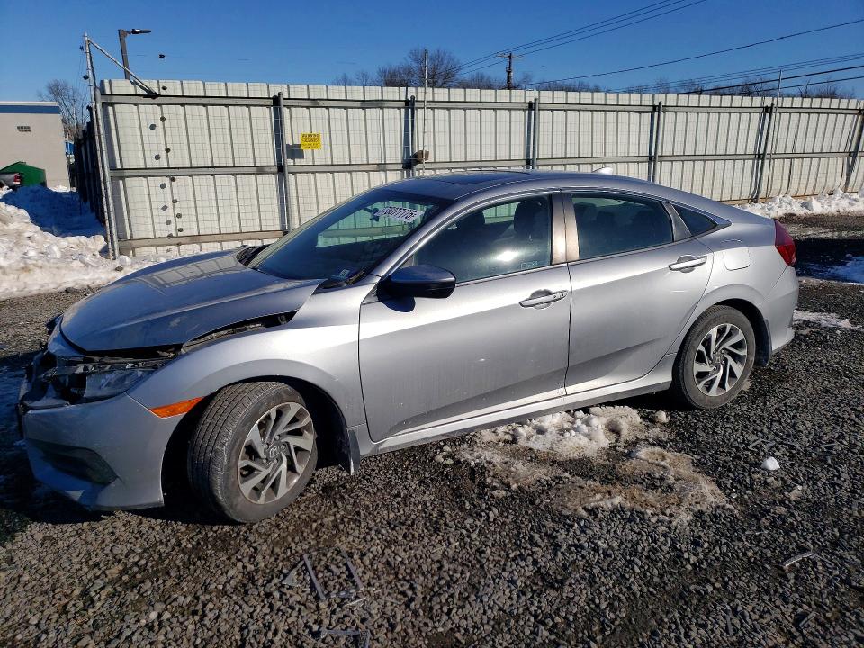 HONDA CIVIC EX 2017 with VIN 19XFC2F7XHE213008 - Photo from auction