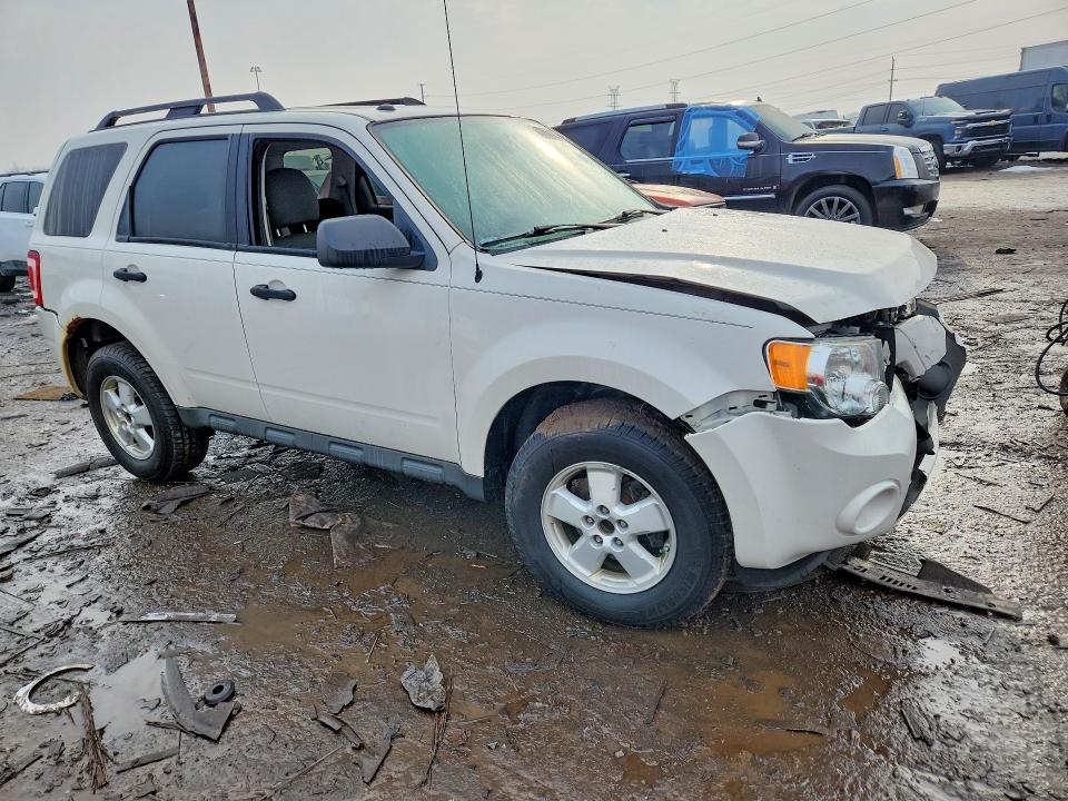 Photo 4 from auction – 2009 FORD ESCAPE with VIN 1FMCU03729KC33837