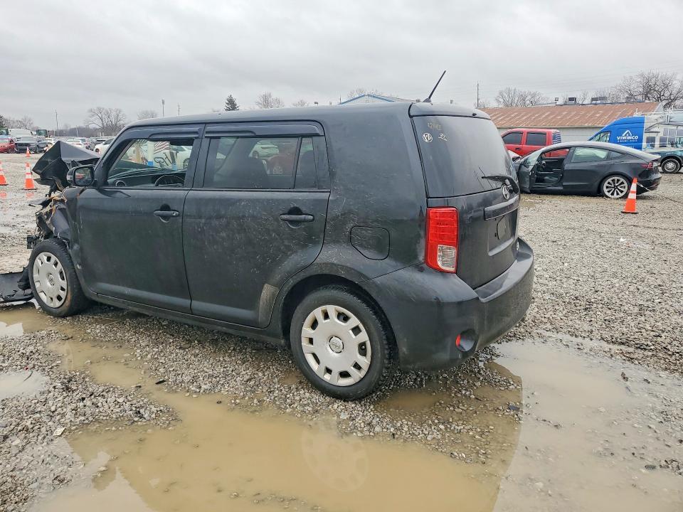 Photo 2 from auction – 2011 TOYOTA SCION with VIN JTLZE4FE7B1119670