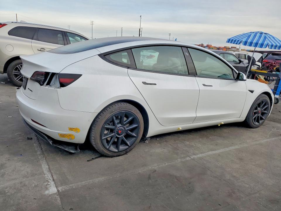 Photo 3 from auction – 2021 TESLA MODEL 3 with VIN 5YJ3E1EA7MF006424