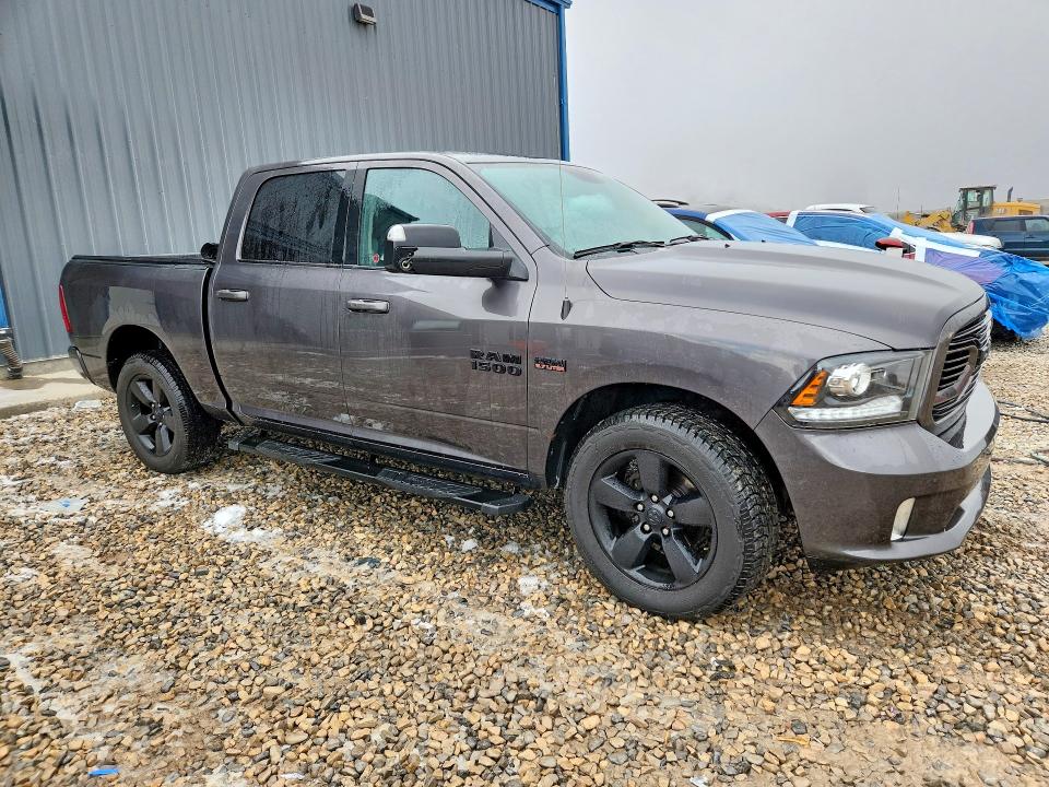 Photo 4 from auction – 2018 RAM 1500 with VIN 1C6RR7MT6JS154333