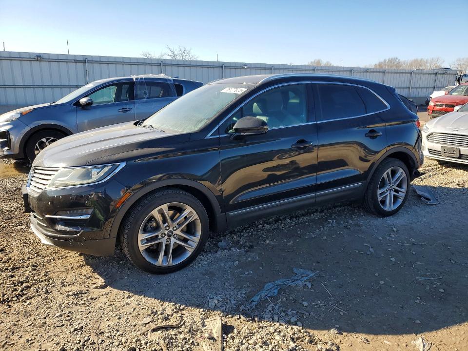 LINCOLN MKC 2015 with VIN 5LMTJ2AHXFUJ03737 - Photo from auction