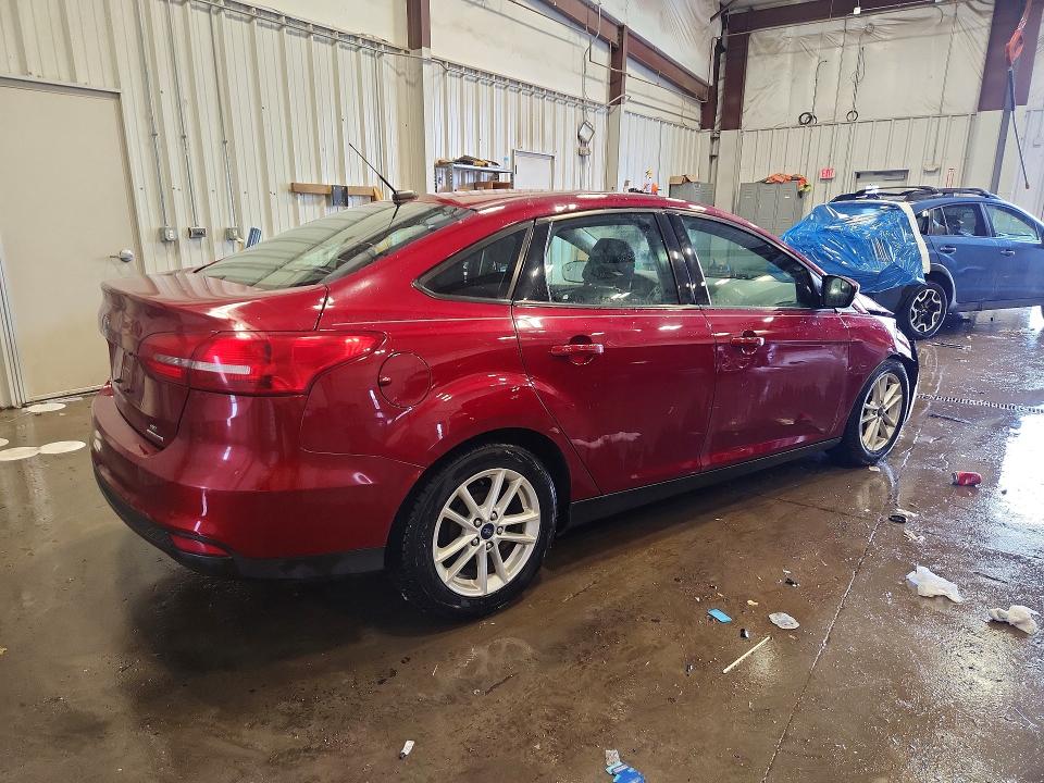 Photo 3 from auction – 2016 FORD FOCUS with VIN 1FADP3F29GL357716