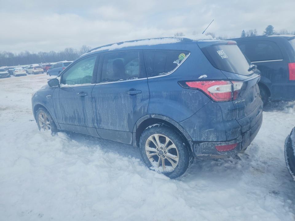 Photo 2 from auction – 2018 FORD ESCAPE with VIN 1FMCU9GD9JUB69213