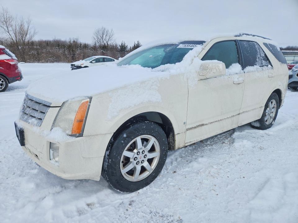 CADILLAC SRX 2009 with VIN 1GYEE437X90149031 - Photo from auction