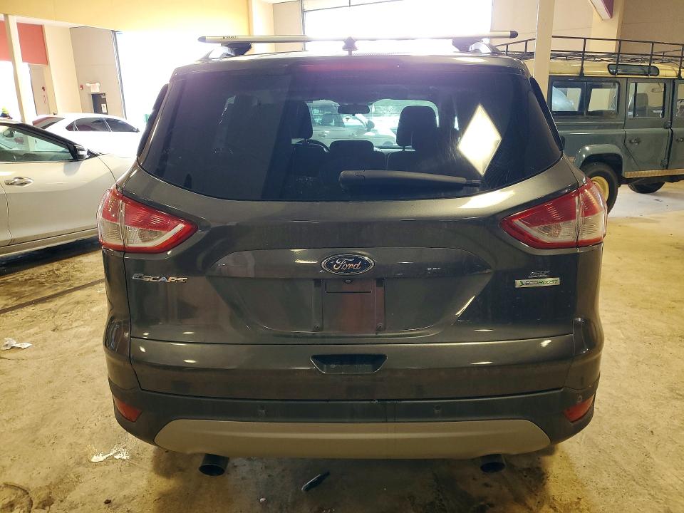 Photo 6 from auction – 2015 FORD ESCAPE with VIN 1FMCU0GX9FUB34653