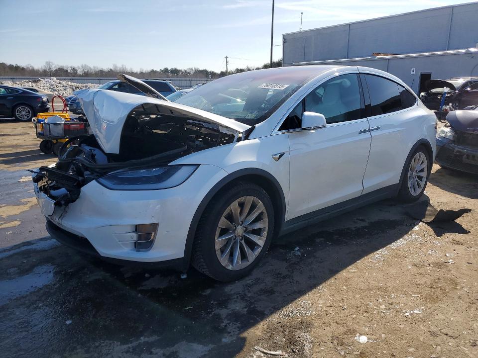 TESLA MODEL X 2017 with VIN 5YJXCBE21HF037888 - Photo from auction